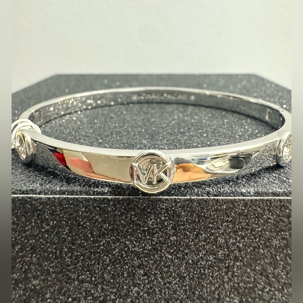 Michael Kors Logo Bezeled Pavé Bangle in Silver